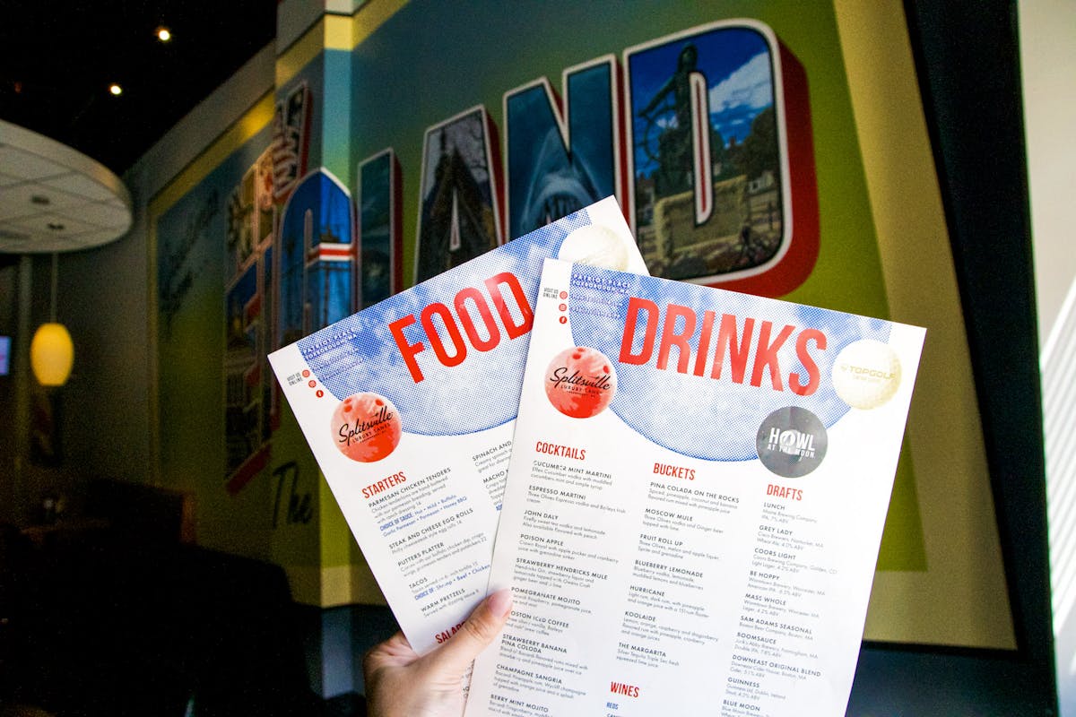 a close up of two restaurant menus